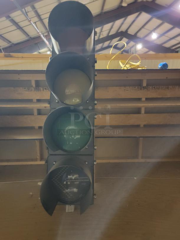 Lot of 2 McCain 4-section polycarbonate traffic signals with LED modules and mounting hardware. Durable and weather-resistant.