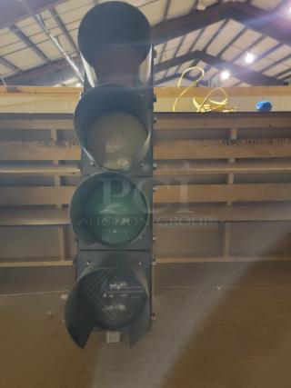 Lot of 2 McCain 4-section polycarbonate traffic signals with LED modules and mounting hardware. Durable and weather-resistant.