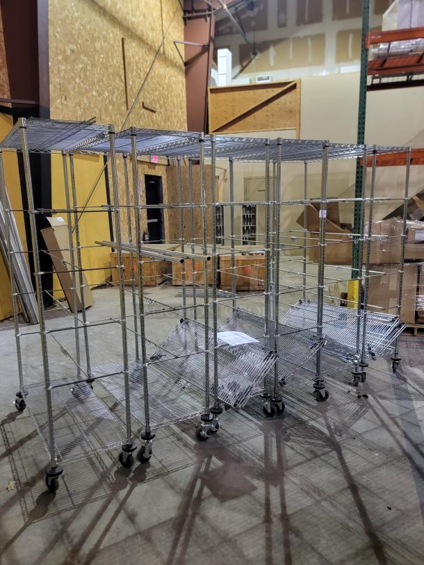 Lot of six Metro Super Erecta mobile shelving units with chrome-plated wire, stem casters, and additional shelves for custom storage.
