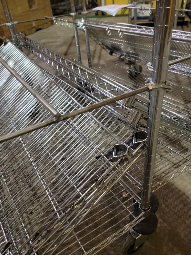 *New* Lot of 6 Metro Super Erecta mobile shelving units in chrome-plated wire, featuring smooth-rolling stem casters.