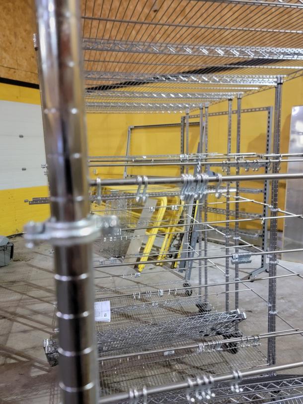 Lot of six Metro Super Erecta mobile shelving units in chrome, featuring smooth-rolling casters and additional shelves.