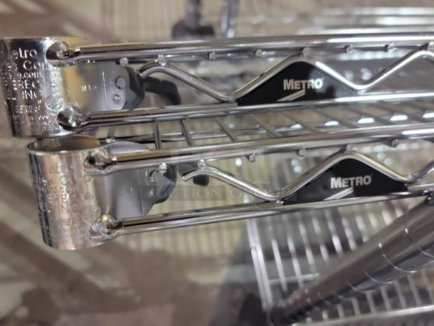 Metro Super Erecta mobile shelving units, chrome-plated wire, with "Metro" label, smooth-rolling casters, additional shelves.