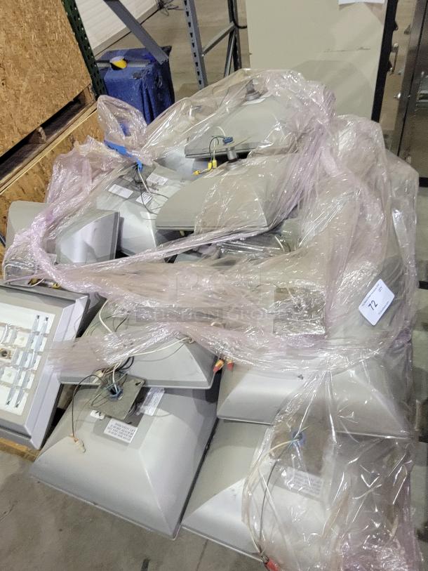 Two pallets of LSI Industries Crossover XPGP LED canopy lights, industrial-grade, wet location-rated, new condition.