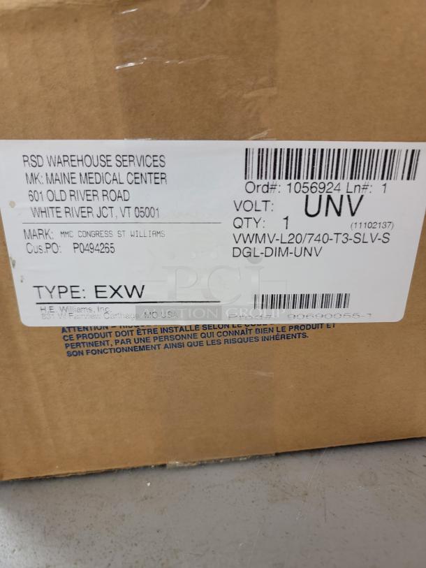 Cardboard box for H.E. Williams LED Wall Lights, model VWMV-L20/740-T3-SLV-S, showing shipping and product details.
