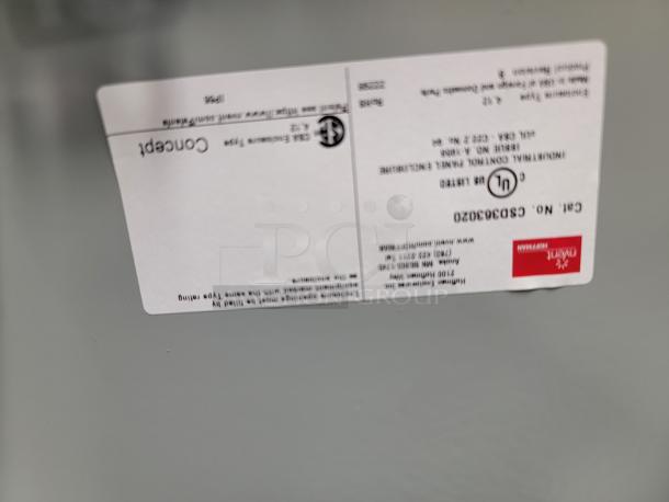 nVent Hoffman control panel CSD363020, gray, new condition, dual-latch door, label showing model info and UL listing.