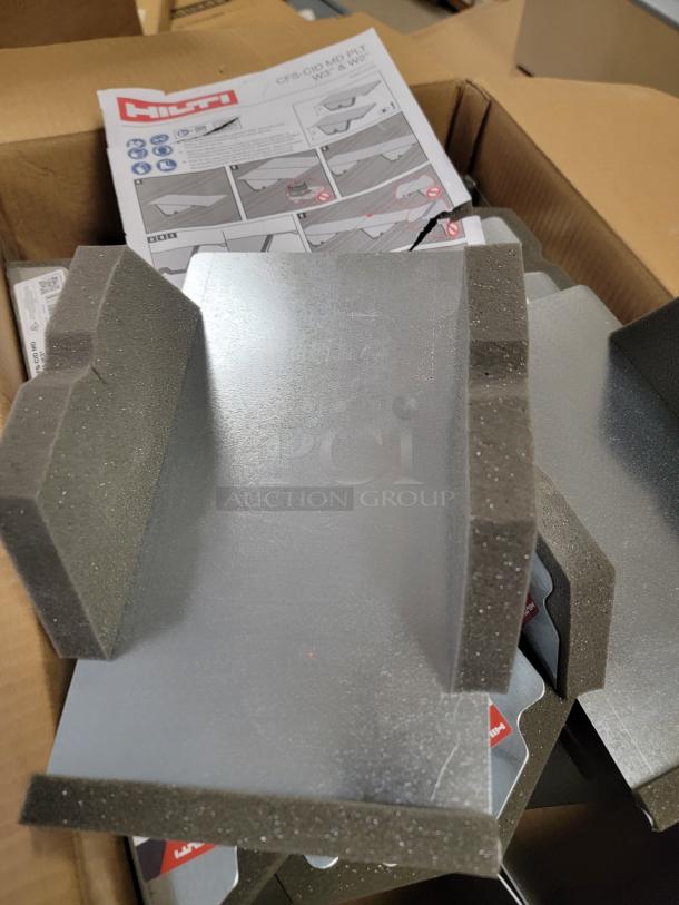 Brand-new lot of 16 Hilti Firestop Cast-In Device Metal Deck Plates, model CFS-CID MD PLT W3, in original packaging.