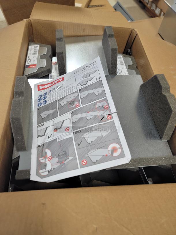 Lot of 16 Hilti Firestop Cast-In Device Metal Deck Plates, model CFS-CID MD PLT W3, new in box with instructional sheet.