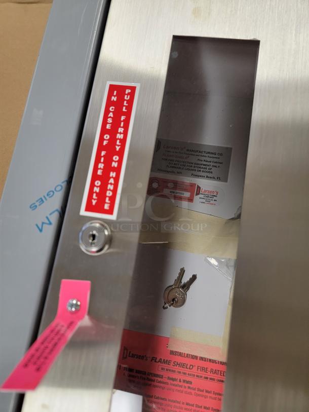 *NEW* Larsen's WHI-595802 fire extinguisher cabinet with stainless steel trim, clear view panel, keys, and security tag.