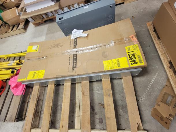 Lot of 3 new Square D MH32, MH38, MH50 electrical panelboard enclosures. Factory-sealed boxes on a pallet.