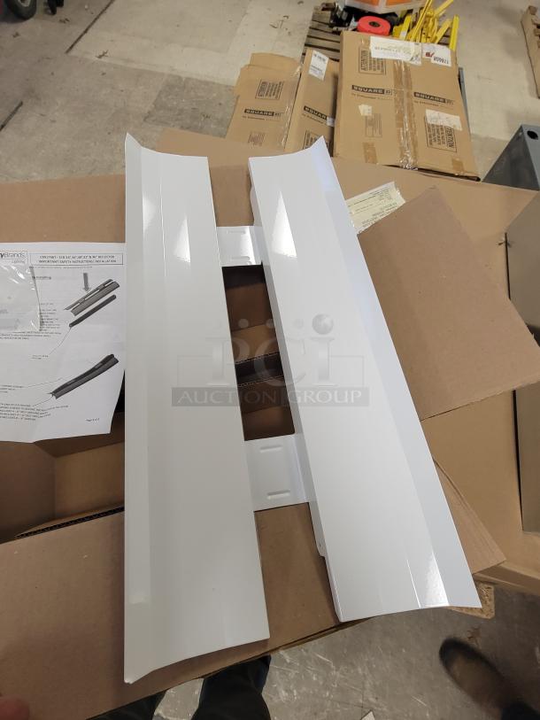 Alt text: Lithonia Lighting ZLR L24 SYM WH reflector kit, new in packaging, includes mounting hardware and instructions.