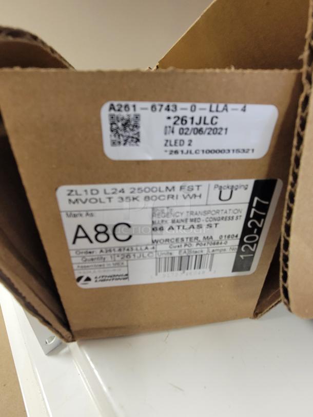 *NEW* Lithonia Lighting ZL1D LED strip lights in box; includes 2' and two 4' fixtures. Features MVOLT 120V-277V, model ZL1D.