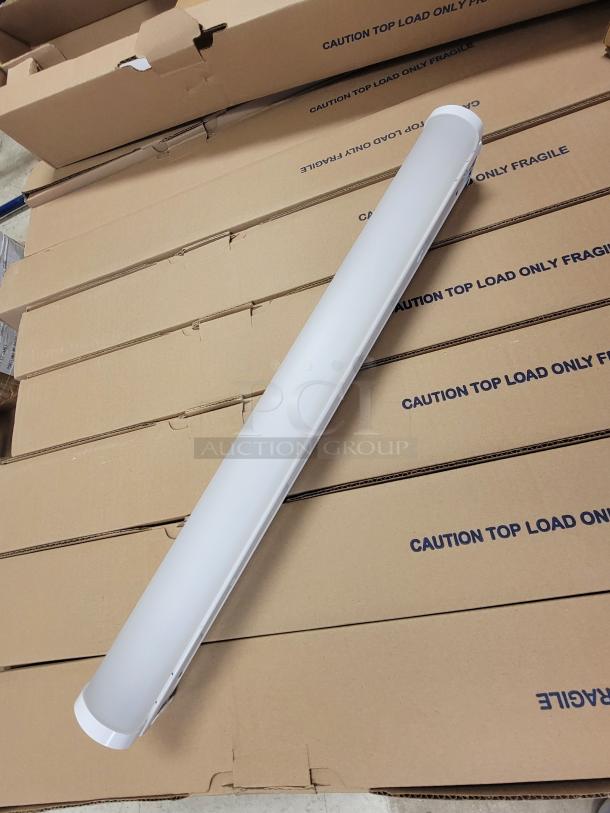 *NEW* Lithonia ZL1D LED strip light on boxes, featuring frosted lens, MVOLT tech, and energy efficiency. Auction lot of 3 units.