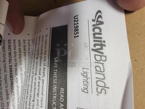 Instruction manual for Lithonia Lighting ZL1D LED strip lights, showing Acuity Brands logo and model number U219851.