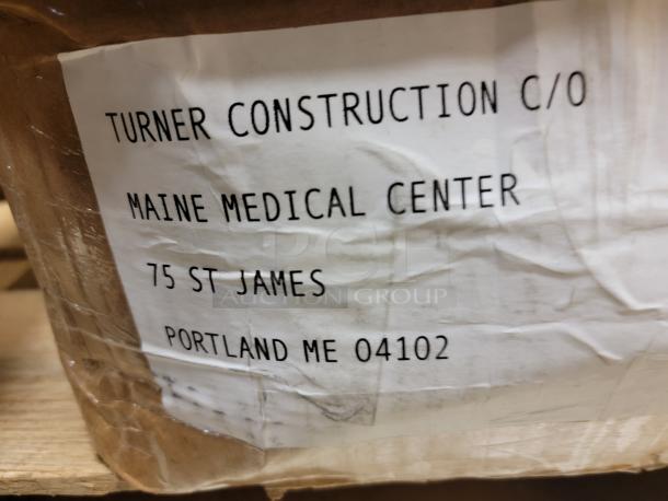 Close-up of a shipping label on a box addressed to Turner Construction at Maine Medical Center, 75 St James, Portland, ME 04102.