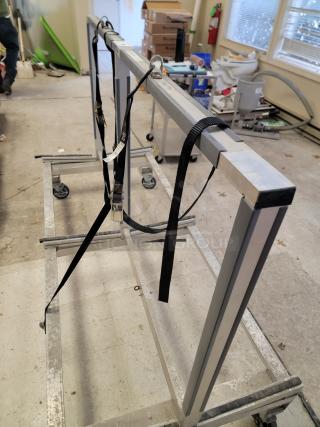 STARC Systems S1-MC mobile carrier with rugged aluminum frame, industrial-strength casters, and ratchet straps for secure panel transport.