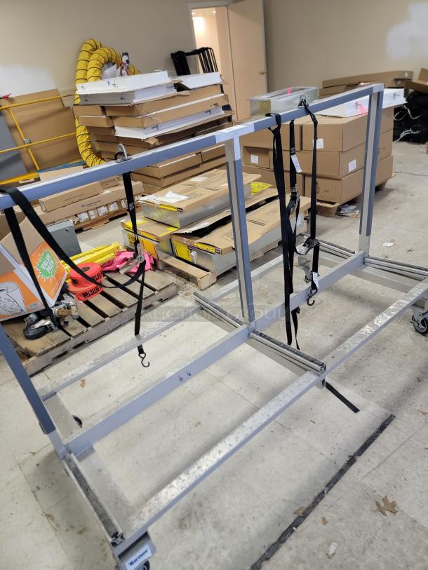 STARC Systems S1-MC Mobile Carrier with aluminum frame, locking casters, and ratchet straps for modular wall transport.