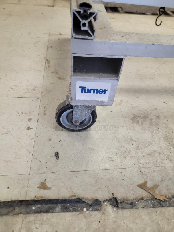 Starc Systems S1-MC mobile carrier, rugged aluminum frame, industrial-strength locking casters, protective rubber-lined rails.