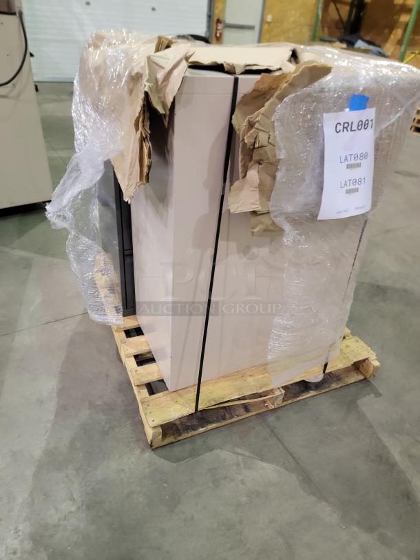 Steelcase and Global storage cabinets on pallet, wrapped in plastic. Includes lateral files and lockers for high-density storage.