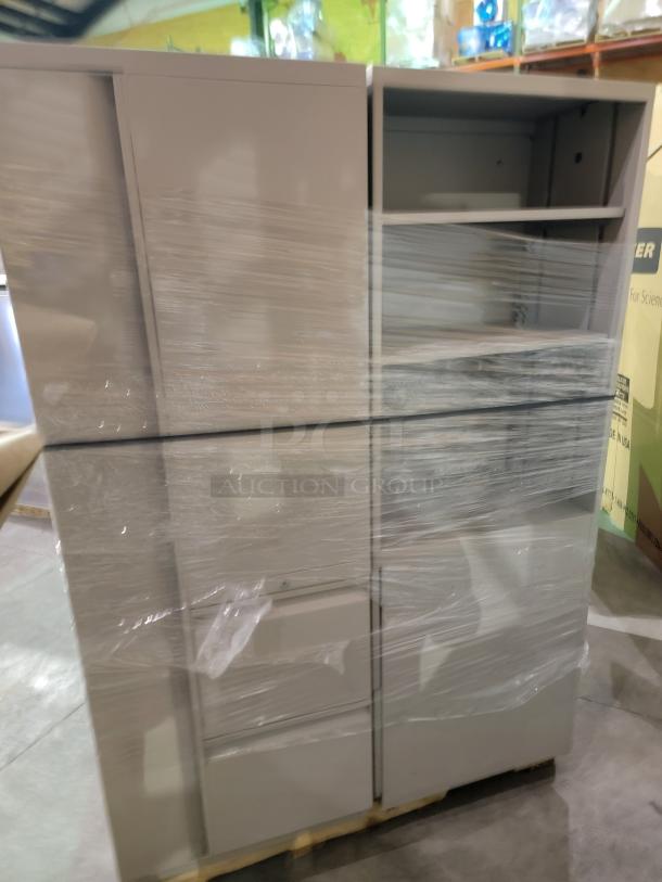 Steelcase and Global commercial steel cabinets, shrink-wrapped on pallet. Includes lateral files and open shelves. Heavy-gauge, powder-coated finish.