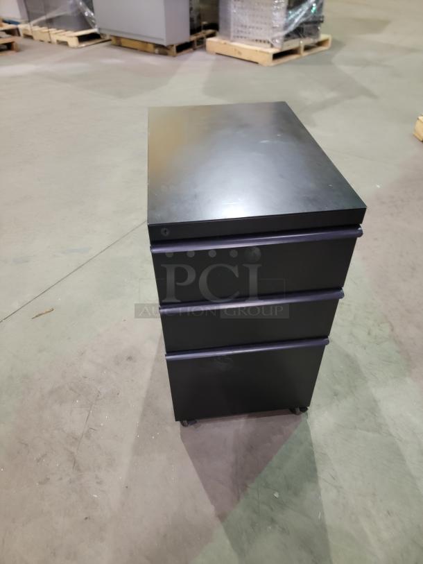HP M2705A mobile storage pedestal with three drawers, steel chassis, smooth casters, in professional-grade condition.