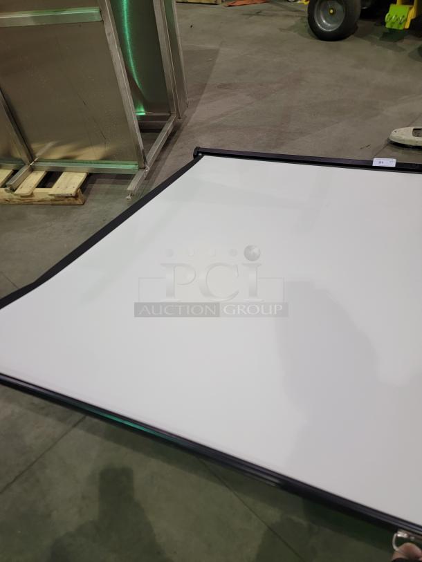 Quartet 7' projection screen with matte white surface, black metal housing, pull-down mechanism, and mounting hardware.