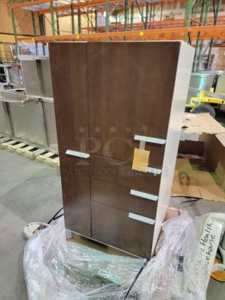 Healthe locking cabinet with dark wood veneer and white chassis. Features integrated lock with key, shelving, and deep drawers.