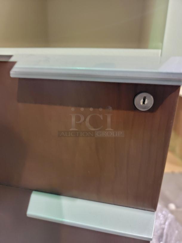 Healthe locking cabinet with dark wood veneer and white chassis, featuring integrated lock for high security storage.