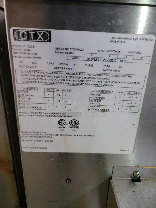 CTX DZ33T commercial conveyor oven label. Model and serial numbers, voltage details, and certifications visible.