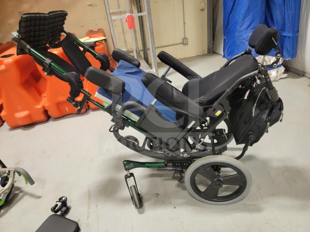 Quickie IRIS Tilt-in-Space Wheelchair, excellent condition, JAY backrest, pressure-relieving seat, elevating leg rests, WC-19 approved.