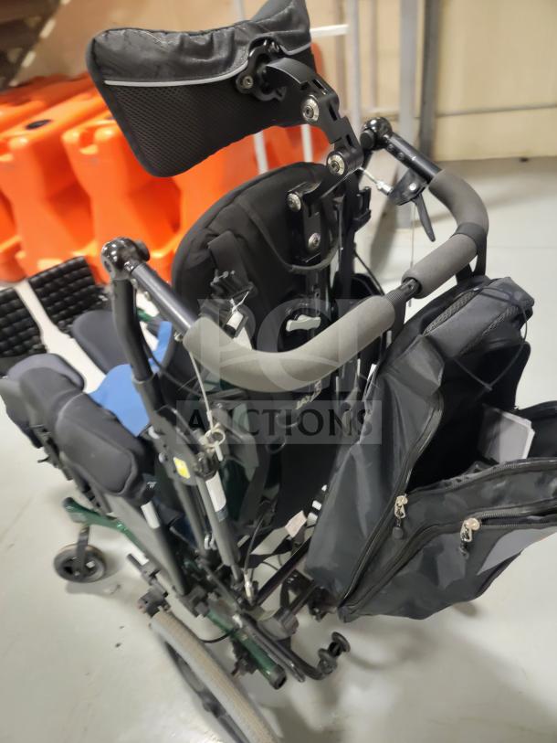 Quickie IRIS Tilt-in-Space Wheelchair, excellent condition, with JAY backrest, pressure-relieving cushion, elevating leg rests.