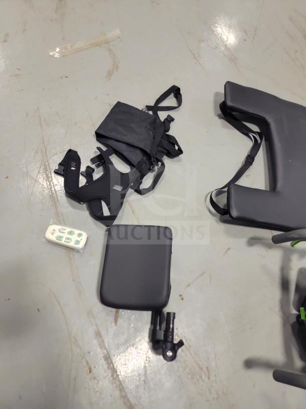 Components of a Quickie IRIS Tilt-in-Space Wheelchair, including JAY contoured backrest and pressure-relieving cushion.