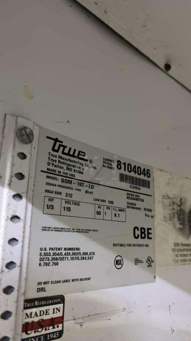 TRUE GDM-19T-LD 27" black refrigerated merchandiser label, model info, voltage 115V, 1/3 HP, with travel case, made in USA.