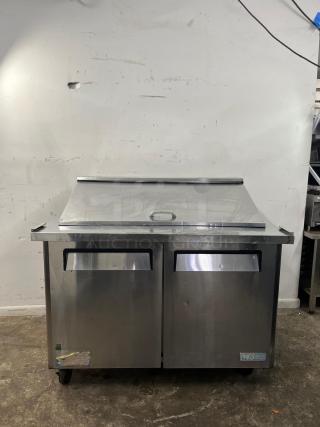 Turbo Air MST-48-18-N sandwich salad prep cooler, 48in, stainless steel, accommodates 18 pans, minor wear visible.