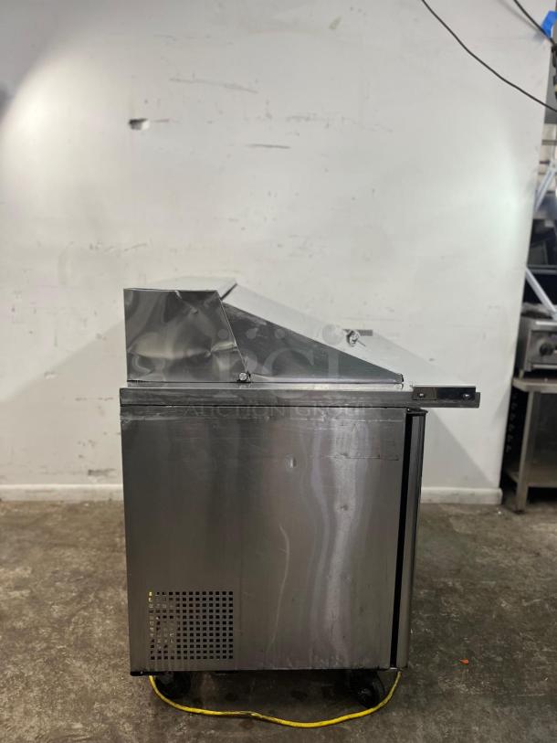 Turbo Air MST-48-18-N 48in sandwich salad prep cooler, stainless steel, accommodates 18 pans, used condition.