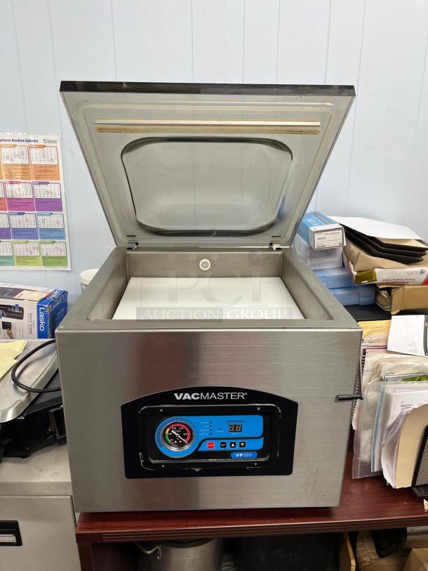 VacMaster VP320 Chamber Tabletop Vacuum Packaging Machine with 16" seal bar, excellent condition, digital display.
