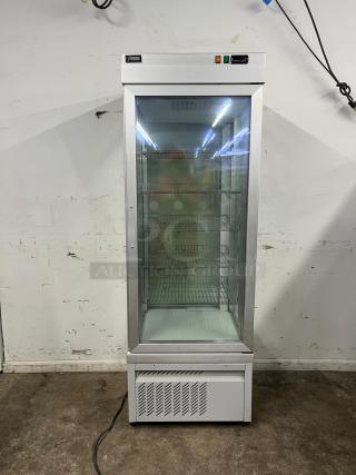 TEKNA 4400 NFP 4-sided glass refrigerated display case, lightly used, features adjustable shelving and temperature controls.