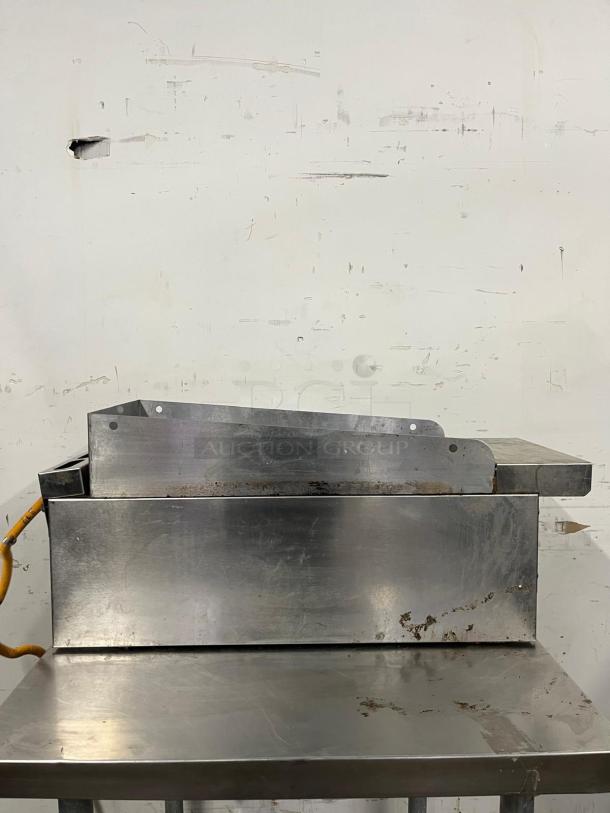 SIERRA SRMG-12 12" countertop gas griddle, 30,000 Btu, manual controls, stainless steel, visible wear, used condition.