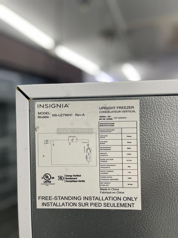Insignia™ 7 Cu. Ft. Upright Convertible Freezer, model NS-UZ70WH4, energy-efficient, label shows specifications and installation info.