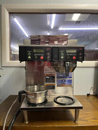 BUNN AXIOM 38700.0096 coffee brewer with 2 upper and 2 lower warmers, stainless steel, visible warning labels, excellent condition.