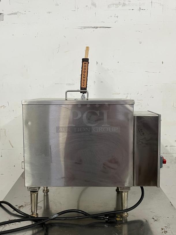 KEGRATOR commercial beer dispenser, portable countertop keg cooler, stainless steel finish, WOODCHUCK tap handle, power cord attached.