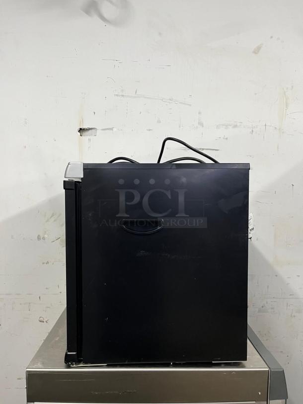 Brand new Weston Pro-1200 12-tray digital dehydrator, 80L, black finish, side view, power cord visible.