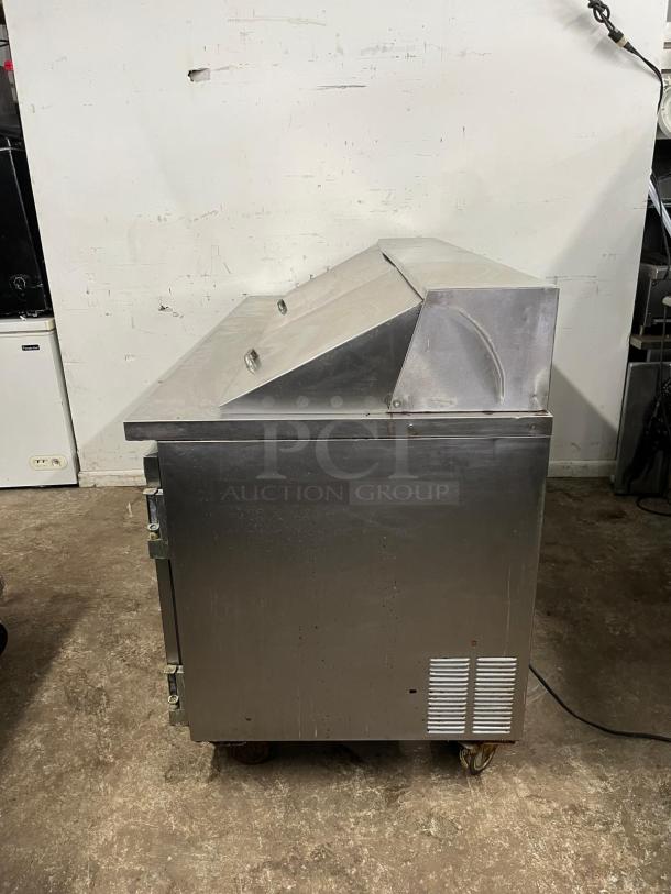 Leader NSFM72 72" 3 Door Mega Top Bain Marie refrigerated prep table; stainless steel, used condition.