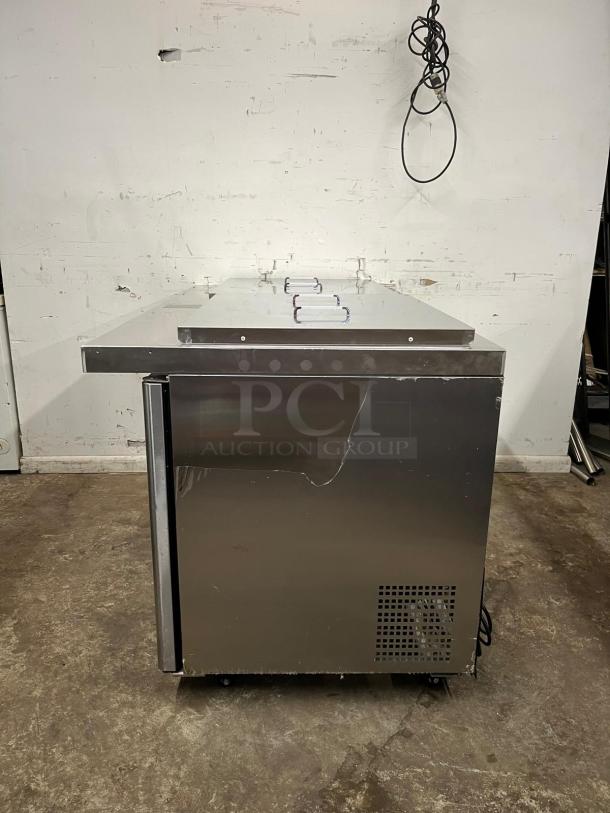 Atosa MSF8307GR 60" double door prep table with stainless steel construction and visible surface damage.