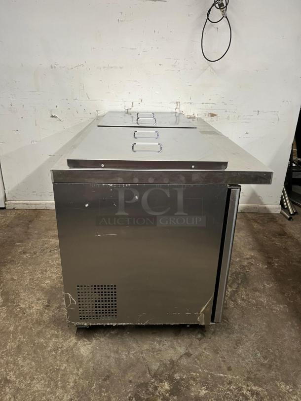 Atosa MSF8307GR 60" double door prep table with stainless steel exterior, in used condition, visible scratches on surface.