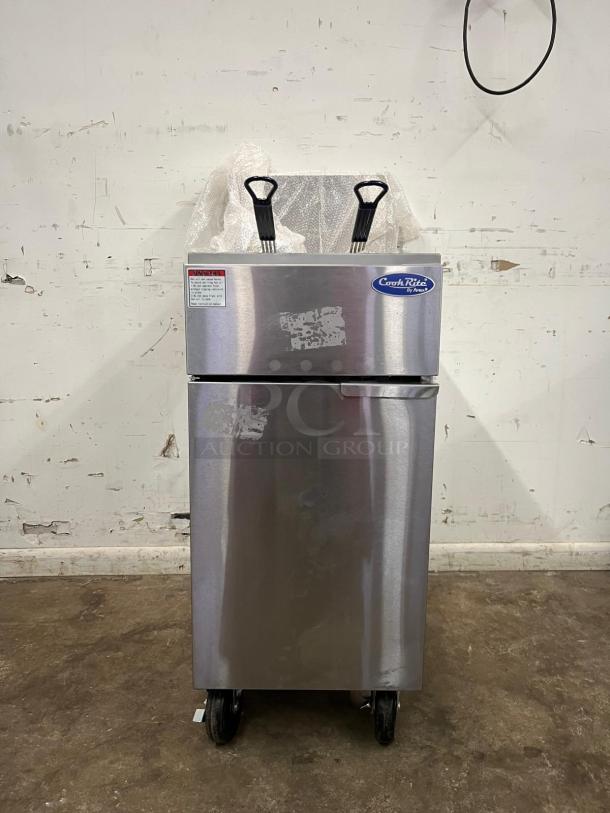 Brand new Atosa ATFS-50 CookRite 50 lb heavy-duty gas fryer with 4 burners, stainless steel finish, on wheels.