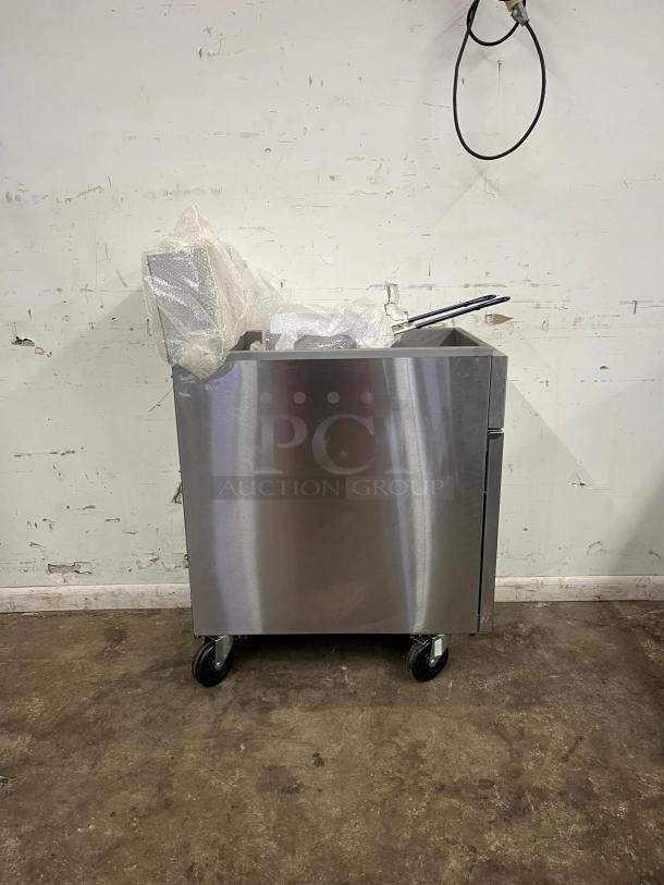 BRAND NEW Atosa ATFS-50 CookRite 50 lb heavy duty gas fryer with 4 burners, stainless steel, in original packaging.