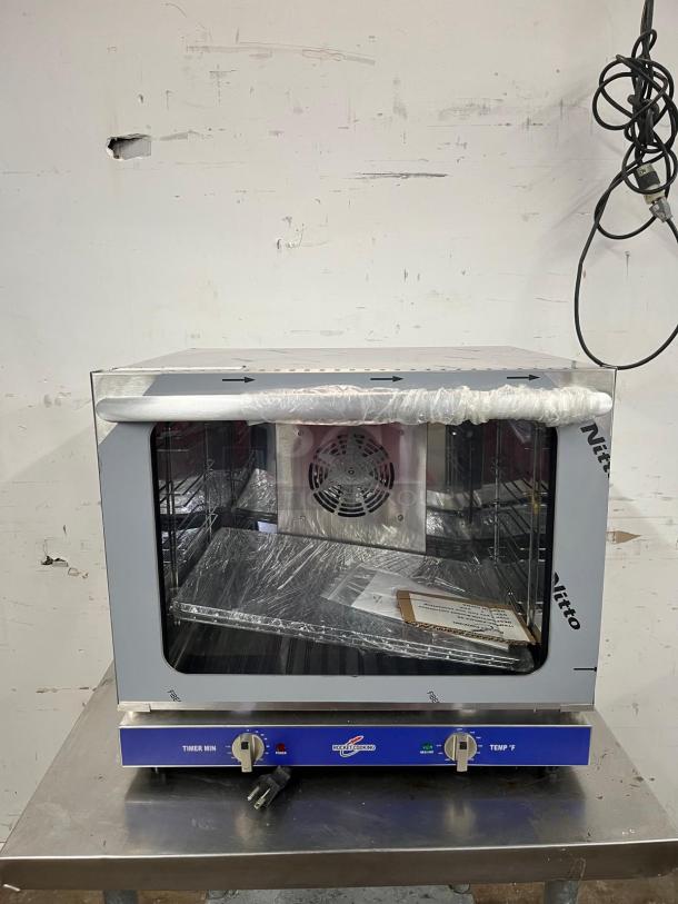 EVERNEW ENCOV-28 countertop convection oven, half-size, stainless steel, new condition, visible control knobs, power cord attached.