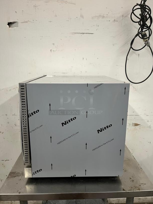 EVERNEW ENCOV-28 Enhanced Countertop Convection Oven, half-size, in new condition, protective plastic intact, side view.