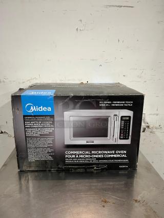 Midea 1025F1A 1000W light duty commercial microwave, .9 cu ft, in original packaging, membrane touch controls, black and silver.