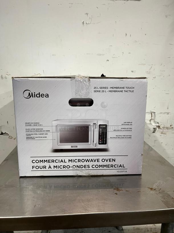 Midea 1025F1A commercial microwave, 1000W, .9 cuft in box. Features LED display, multiple time settings, stainless steel. New condition.
